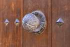 Albaicin, Province of Granada, Andalusia, Spain. Metal knob on an old wooden door. Art Print